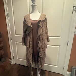 Elegant sheer cardigan with bell sleeves. Dress with lace trim.